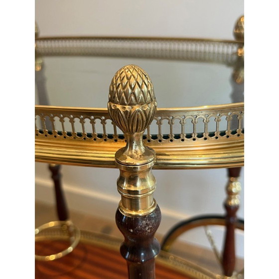 Image 1 of Vintage oval brass and mahogany table on wheels by Maison Baguès, 1940