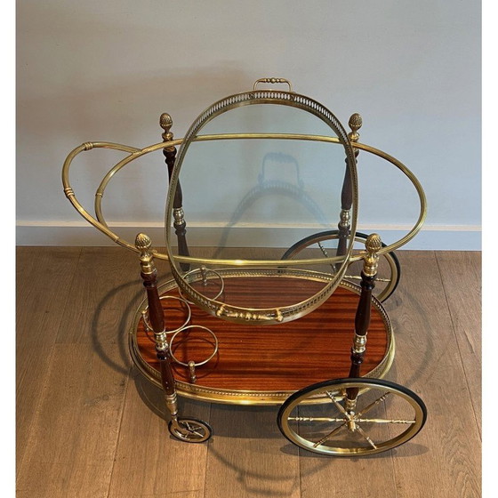 Image 1 of Vintage oval brass and mahogany table on wheels by Maison Baguès, 1940