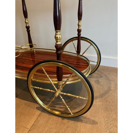 Image 1 of Vintage oval brass and mahogany table on wheels by Maison Baguès, 1940