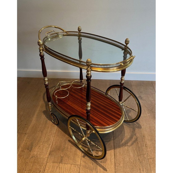 Image 1 of Vintage oval brass and mahogany table on wheels by Maison Baguès, 1940