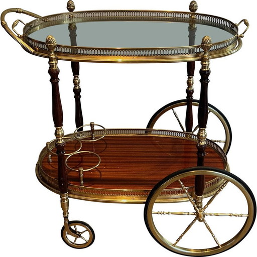 Vintage oval brass and mahogany table on wheels by Maison Baguès, 1940