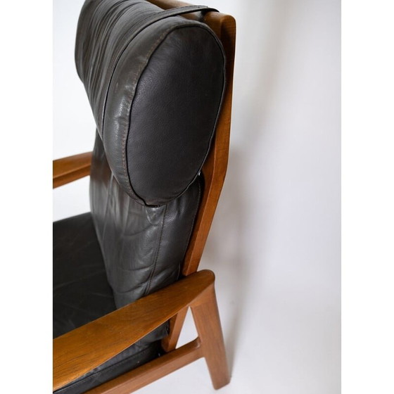 Image 1 of Vintage armchair with teak stool upholstered in black leather by Arne Vodder for Komfort, 1960