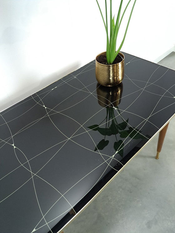 Image 1 of Extendable And Height Adjustable Table With Glass Top