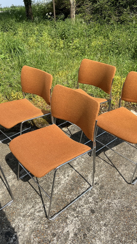 Image 1 of 7x David Rowland Howe orange with chrome stacking chairs