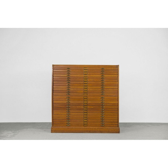 Image 1 of Vintage oak filing cabinet with several drawers, 1930