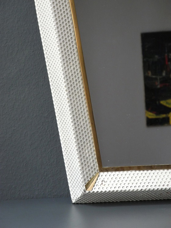 Image 1 of Original Mid Century Modern XXL illuminated mirror with perforated metal frame and brass details | Made in France