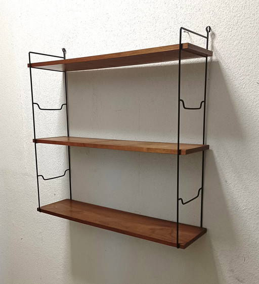 sixties books / wall rack with three shelves