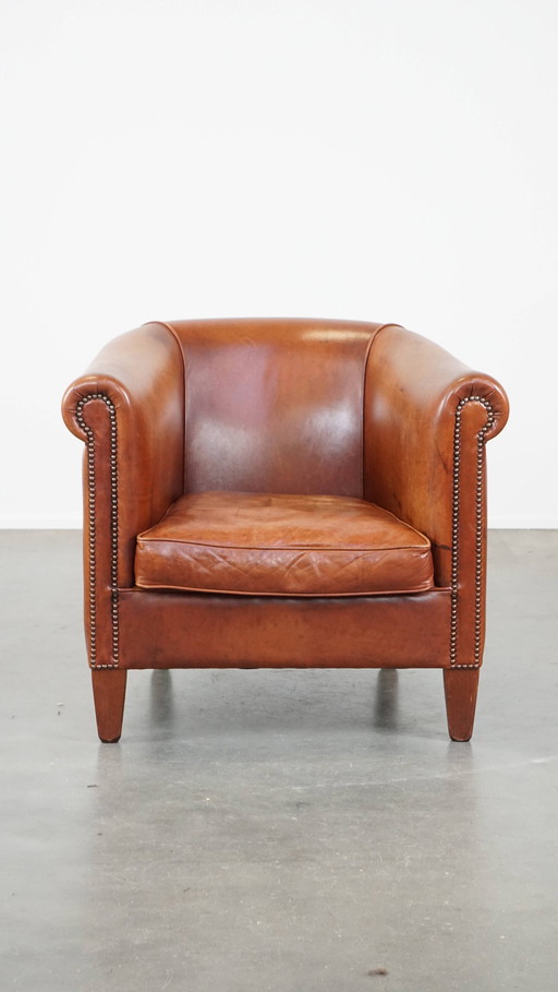 Beef Leather Club Chair With A Finished With Ornamental Nails