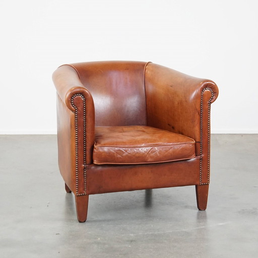 Beef Leather Club Chair With A Finished With Ornamental Nails