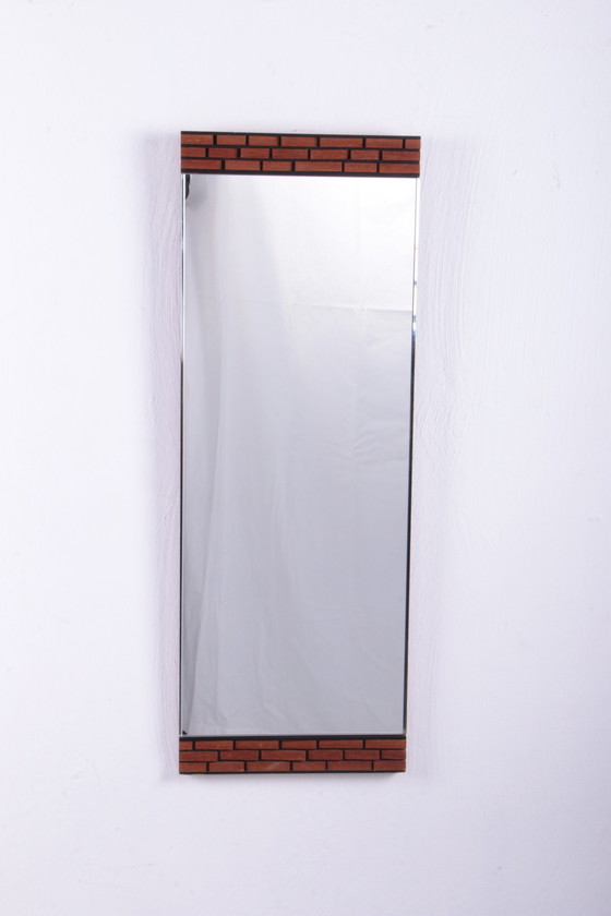 Image 1 of Oblong wall mirror with block pattern