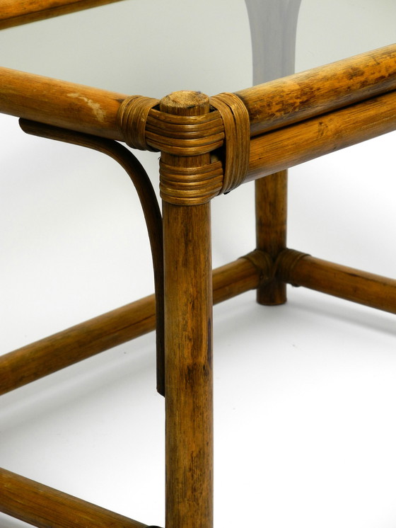 Image 1 of Beautiful 1970s dark bamboo wood couch or side table with smoked glass top