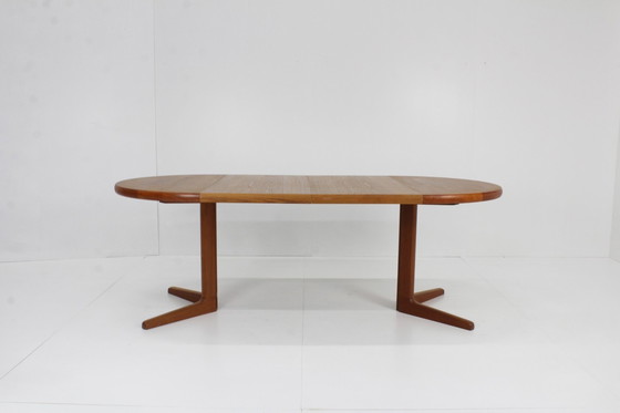 Image 1 of Danish round extendable dining table