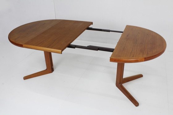 Image 1 of Danish round extendable dining table