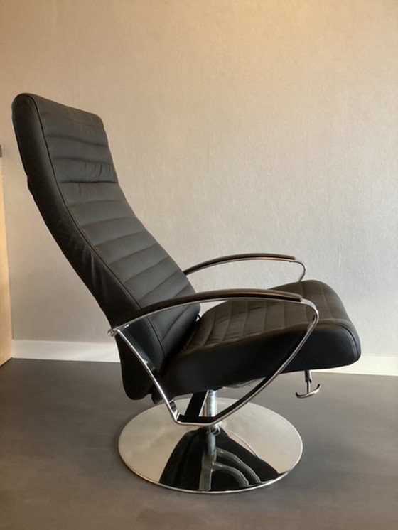 Image 1 of BoConcept Wing swivel armchair with footstool