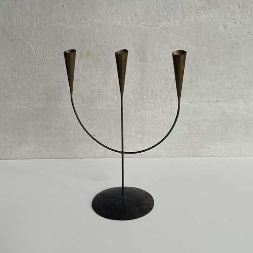 brass three-arm candelabra