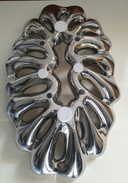 Ciotola di design in ceramica argentata, traforata