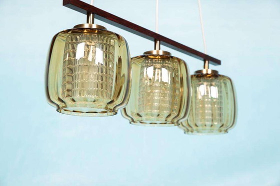 Image 1 of Lampe suspendue vintage en verre ambré Design suédois, Midmod Lampe en verre