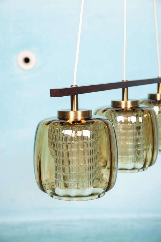 Image 1 of Lampe suspendue vintage en verre ambré Design suédois, Midmod Lampe en verre