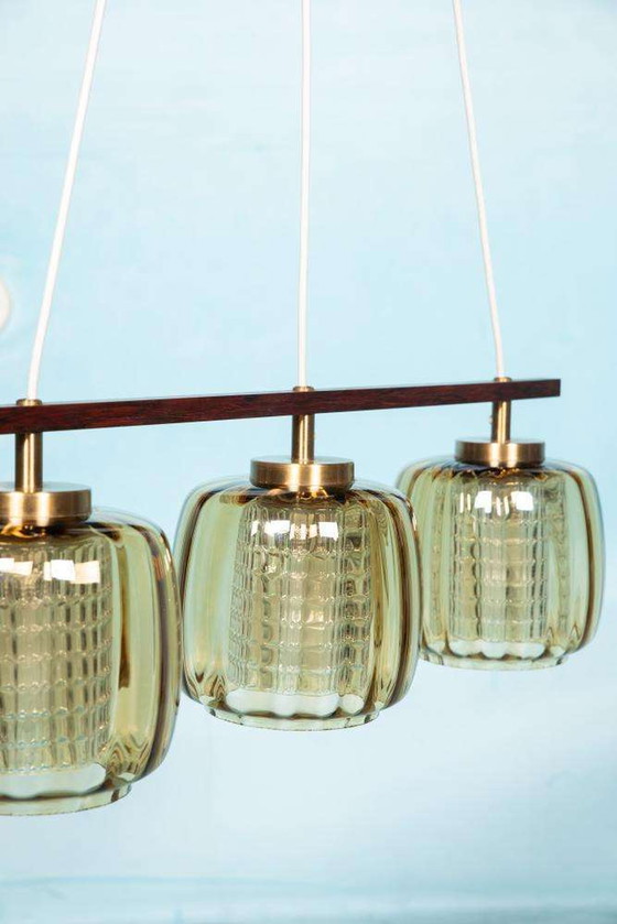 Image 1 of Lampe suspendue vintage en verre ambré Design suédois, Midmod Lampe en verre