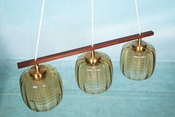 Image 1 of Lampe suspendue vintage en verre ambré Design suédois, Midmod Lampe en verre