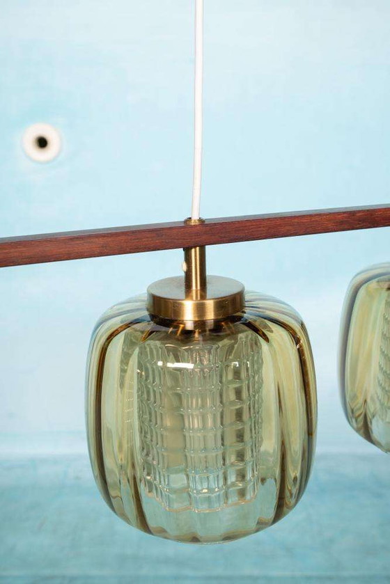 Image 1 of Lampe suspendue vintage en verre ambré Design suédois, Midmod Lampe en verre
