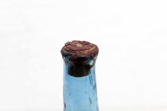 Image 1 of Blown glass and metal bottle by Felipe Derflingher. 1960