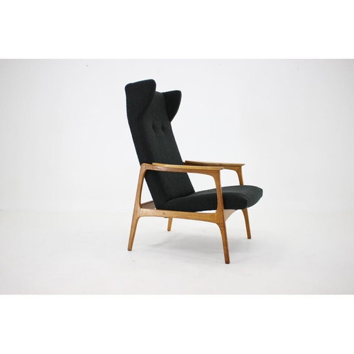 Vintage oak wood Wing armchair in bouclé, Czechoslovakia 1960s