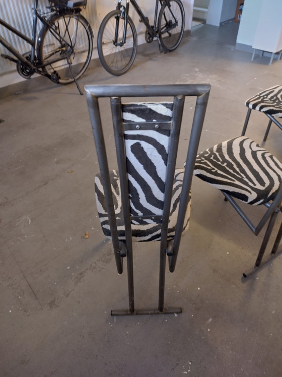 Image 1 of 4x chairs made of tubular steel/ fabric cover