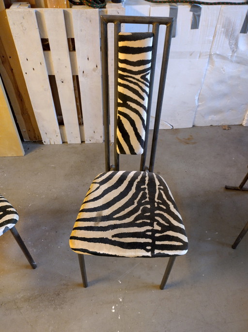 4x chairs made of tubular steel/ fabric cover