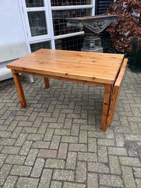 Image 1 of Pine seventies dining room table, hangar table.