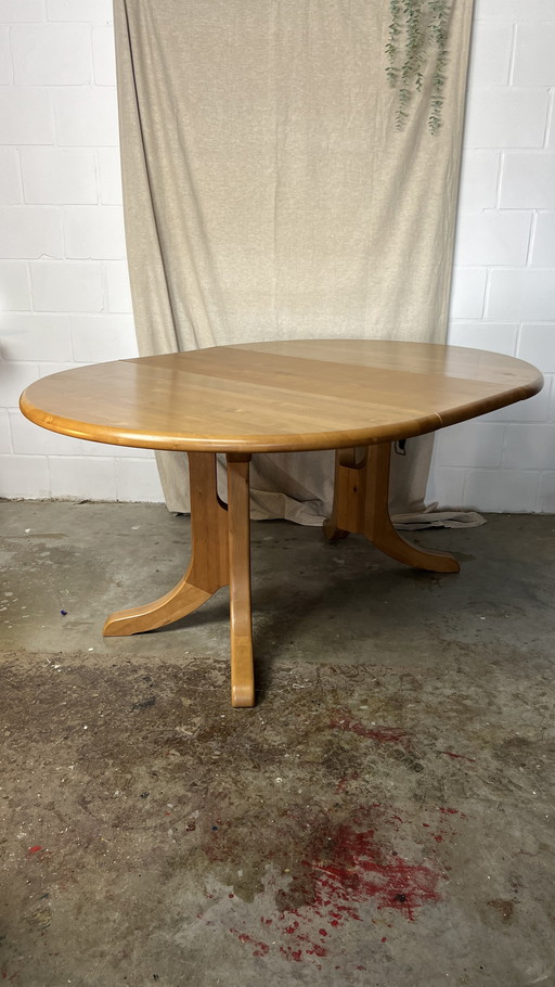 Vintage extendable dining table from round to oval