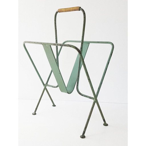 Vintage magazine rack by Jacques Adnet