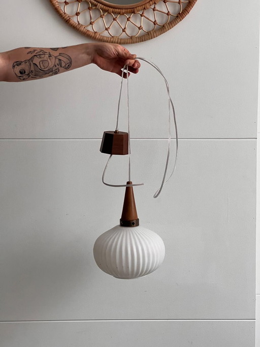 Massive 60's milk glass pendant with wood and metal accents