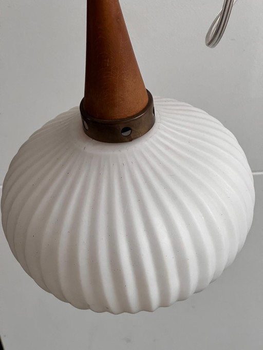 Massive 60's milk glass pendant with wood and metal accents