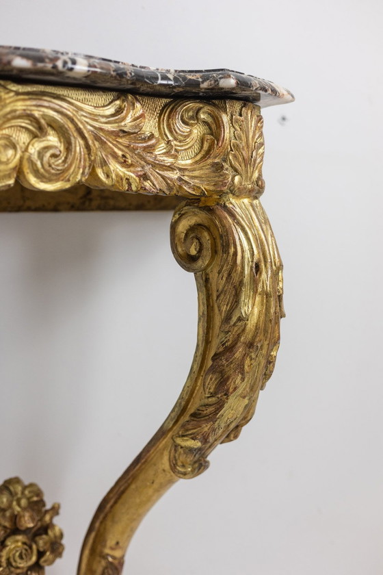 Image 1 of Louis Xv period giltwood and carved console table. Circa 1880.