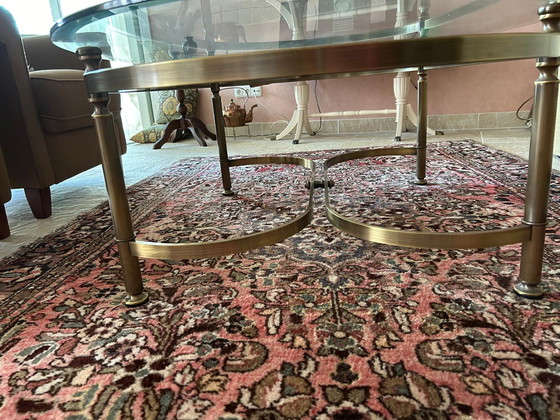 Image 1 of Glass oval coffee table with brass legs