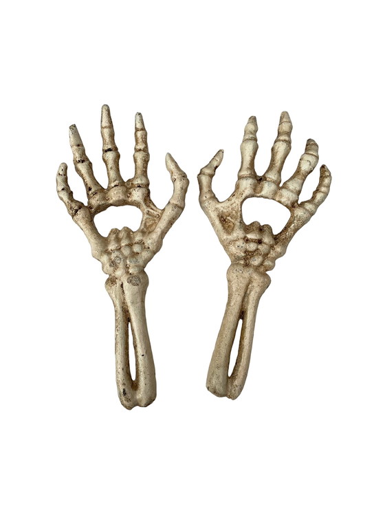 Image 1 of Set Of Two Cast Iron Bottle Openers Shaped Like Skeleton Hands