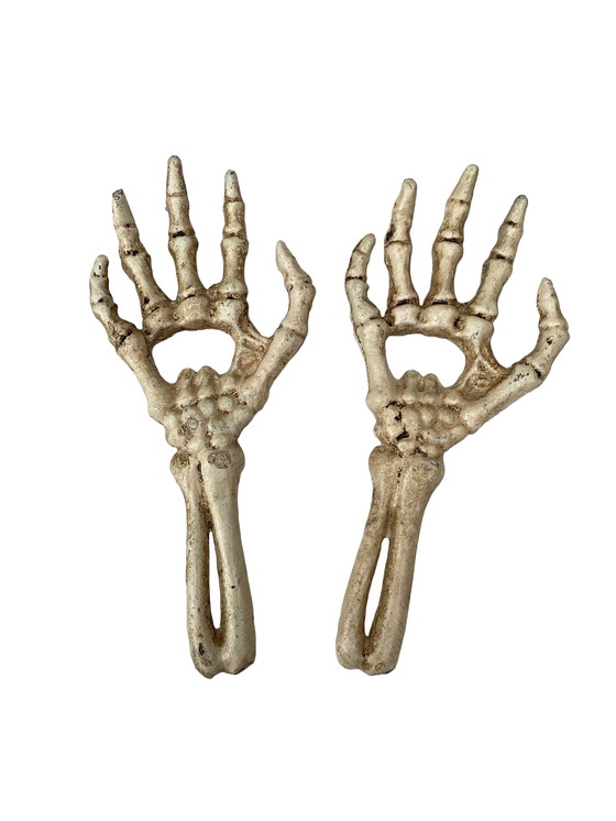 Image 1 of Set Of Two Cast Iron Bottle Openers Shaped Like Skeleton Hands