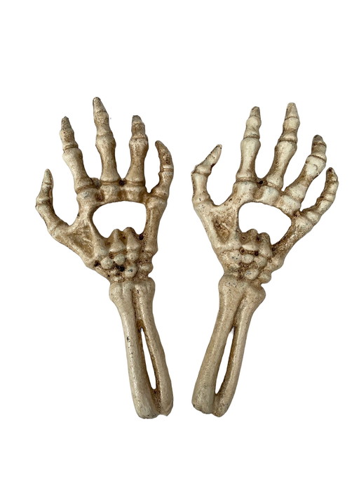 Set Of Two Cast Iron Bottle Openers Shaped Like Skeleton Hands