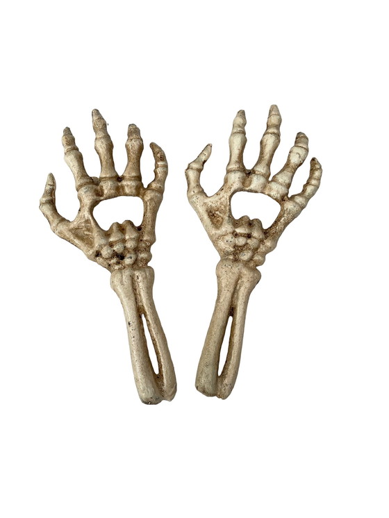 Image 1 of Set Of Two Cast Iron Bottle Openers Shaped Like Skeleton Hands