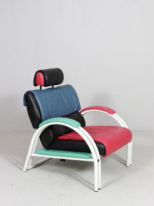 Postmodern lounge chair/armchair with ottoman in the style of Memphis Milano, Italy, 1980s