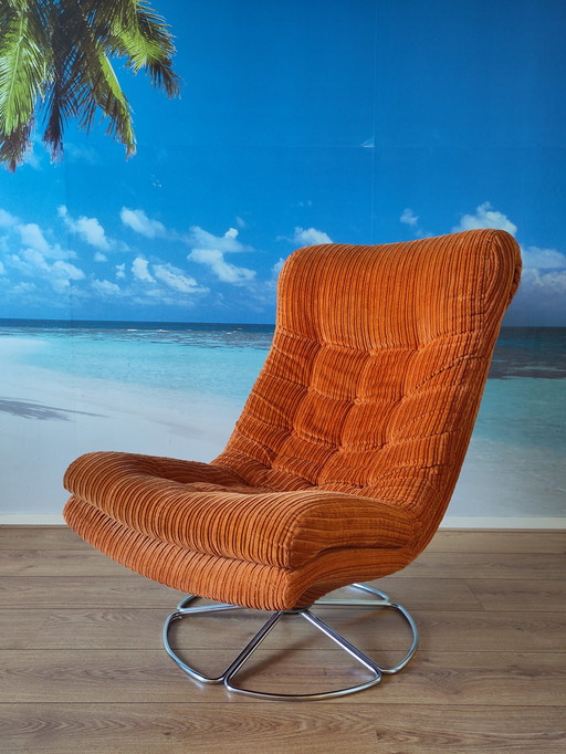 Fauteuil en velours côtelé orange