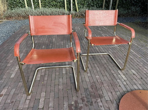 Set of 4 Leather and Copper Cantilever Dining Chairs