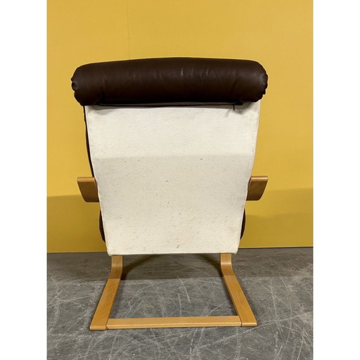 Scandinavian vintage armchair in wood and leather, 1970s