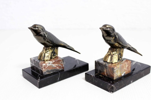 Birds brass books and marble base