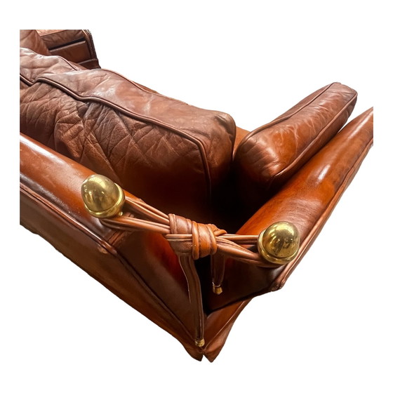 Image 1 of Comfortable sofa made of genuine leather with signs of wear