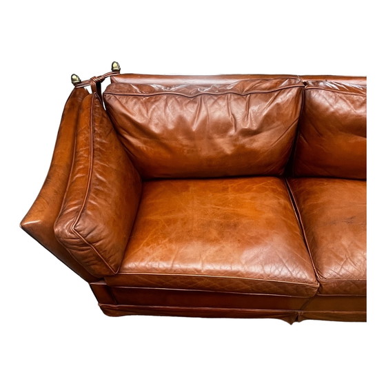 Image 1 of Comfortable sofa made of genuine leather with signs of wear