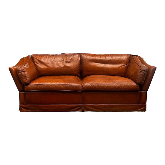 Image 1 of Comfortable sofa made of genuine leather with signs of wear