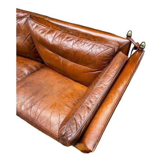 Image 1 of Comfortable sofa made of genuine leather with signs of wear