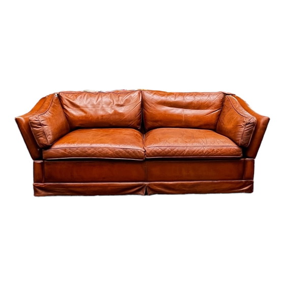 Image 1 of Comfortable sofa made of genuine leather with signs of wear